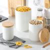 imageMALACASA Canisters Sets for the Kitchen Ceramic Kitchen Canisters for Countertop Coffee Jar with Airtight Wooden Lid Flour and Sugar Containers Set of 3 White Food Storage Jars for Tea Cereal Nut